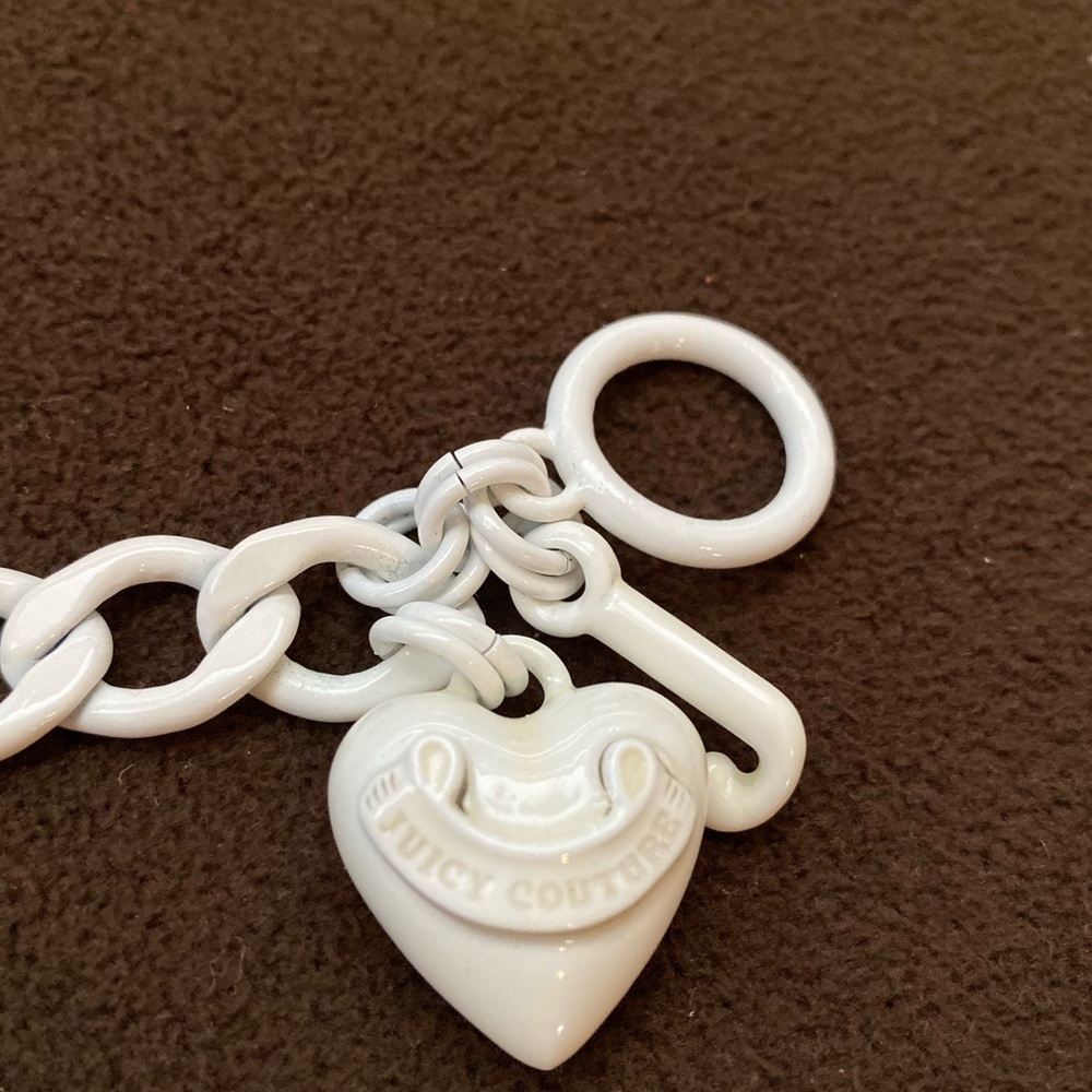 WHITE JUICY COUTURE CHARM BRACELET